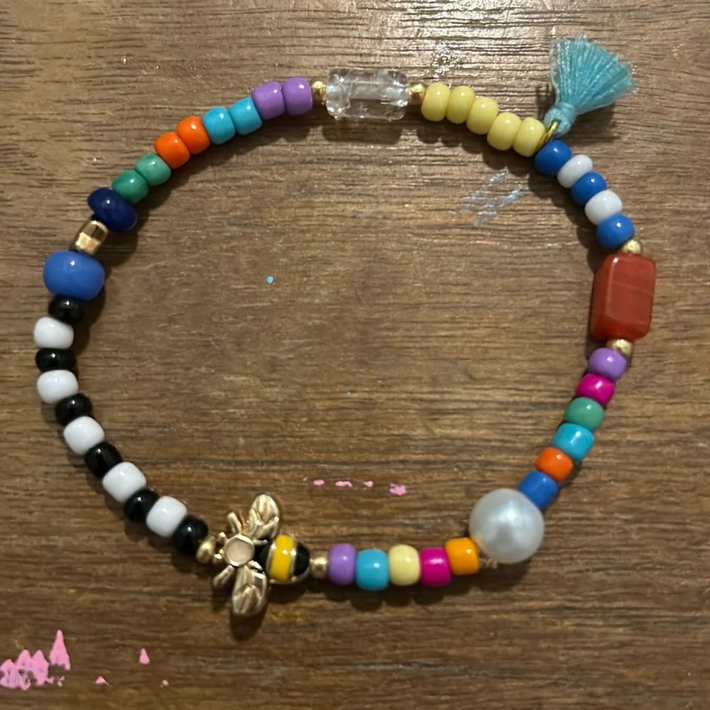 Handmade glass seed bead bracelet. Multi colored. Stretch elastic.